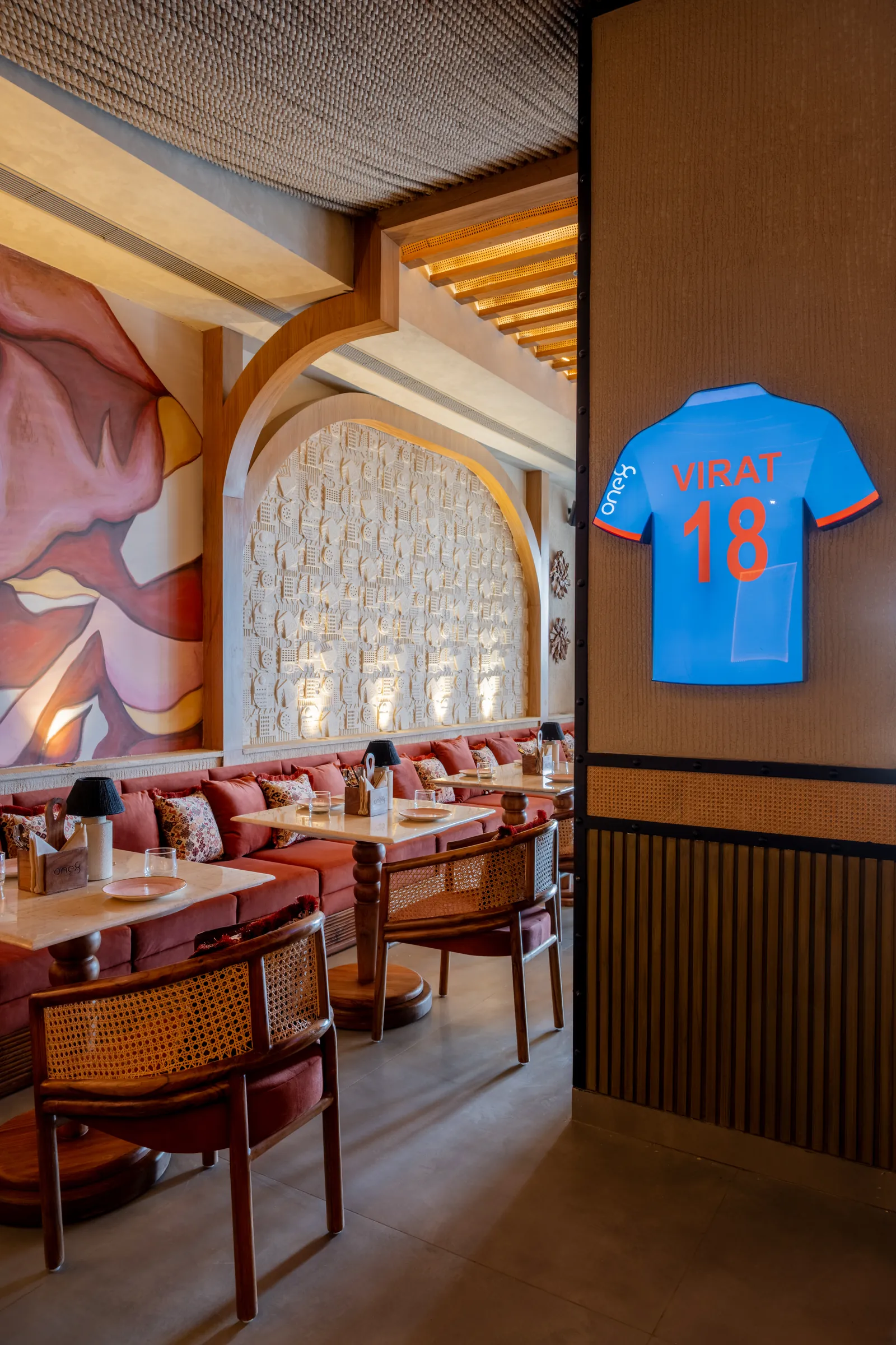 The No. 18 jersey on the dining room pillar