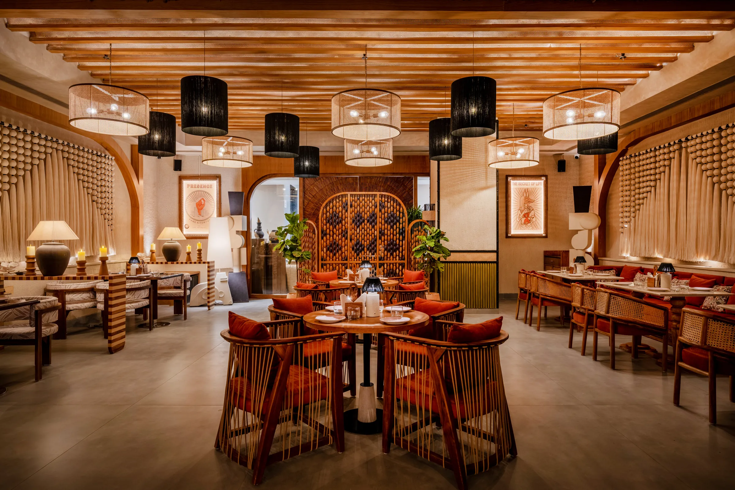 The dining room in symmetry, a carved screen at its heart