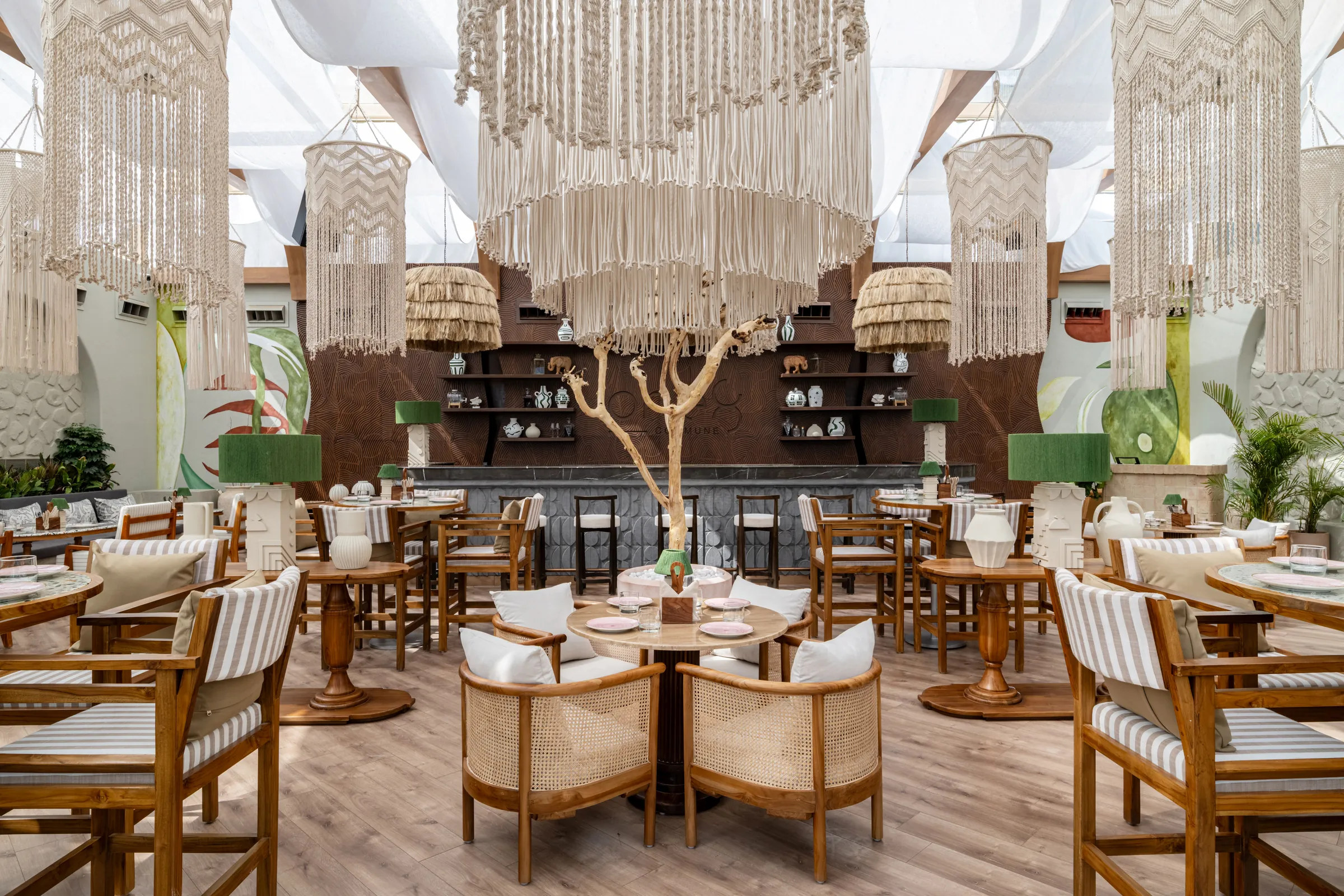 The glasshouse bar under raffia lanterns