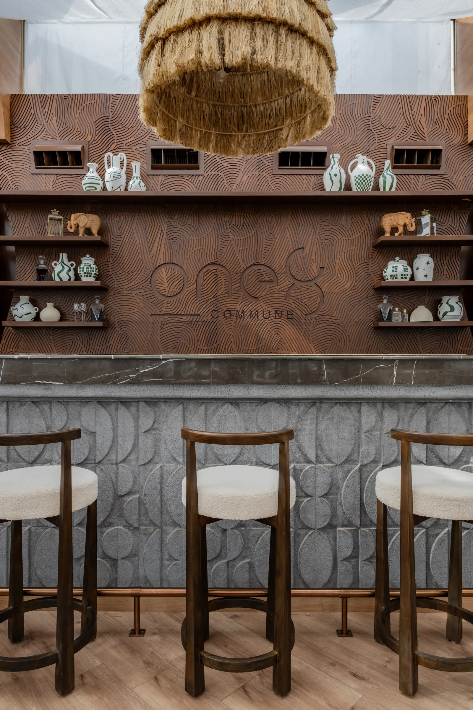 The one8 Commune mark on the glasshouse bar